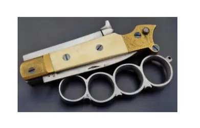 Pistolet combiné poing américain antérieur 1900